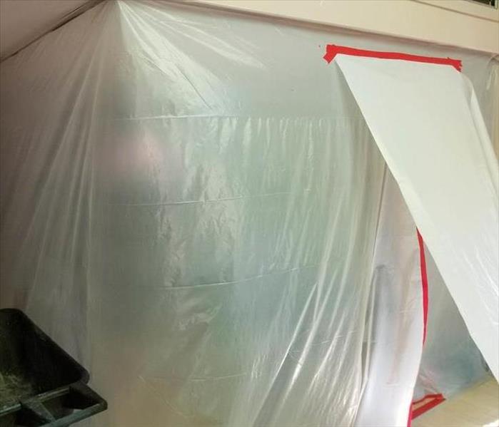 Mold remediation containment is set up so that the mold removal team can safely rid the home of mold