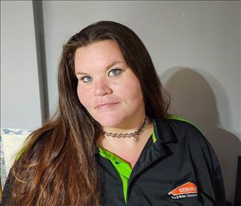 SERVPRO employee with brown hair smiling